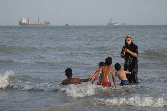 Mother and children in the Strait of Hormuz